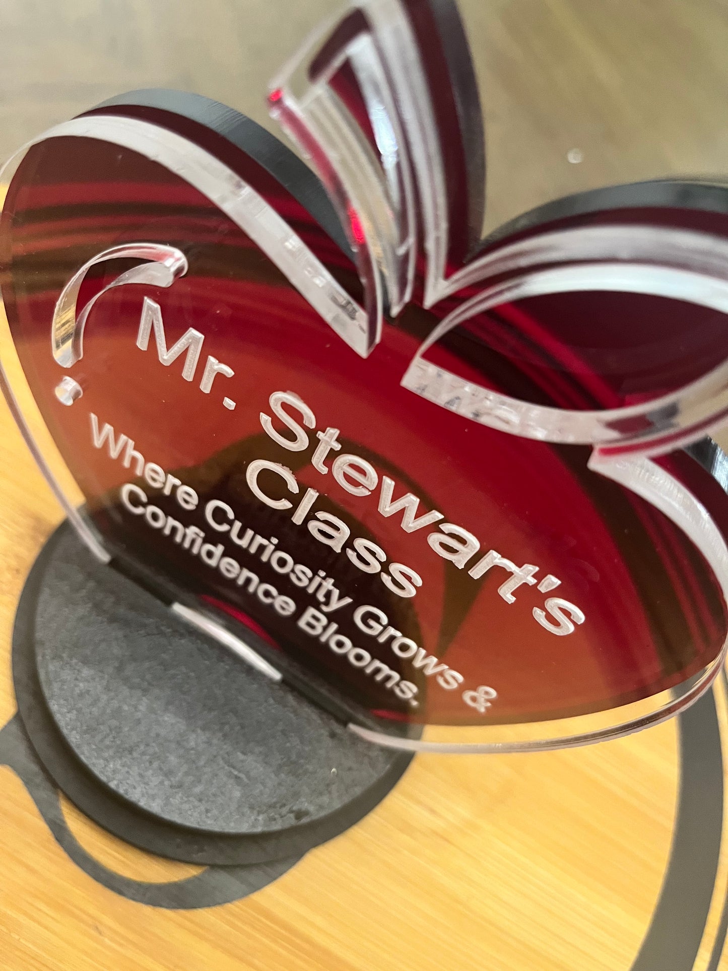 Double layer acrylic apple award with double base. top view.