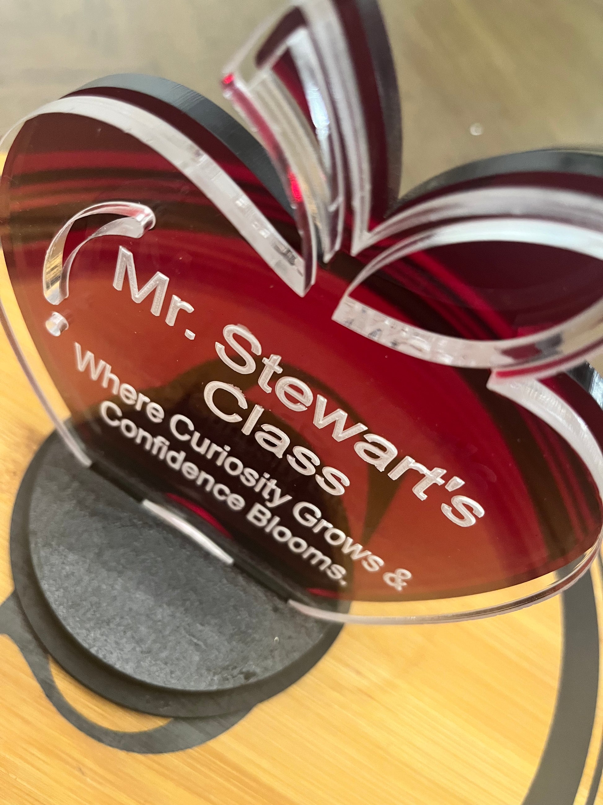 Double layer acrylic apple award with double base. top view.