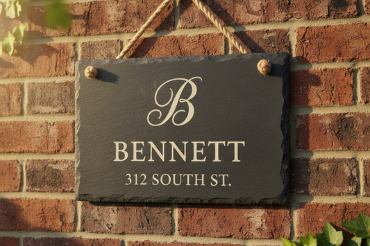 Personalized Bennett slate house number sign on brick exterior